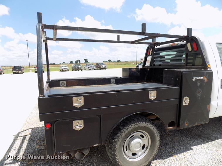 image for item DB9529 2011 Ford F350 Super Duty Crew Cab utility bed pickup truck
