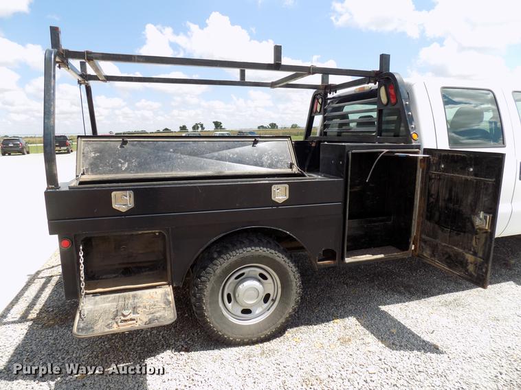 image for item DB9529 2011 Ford F350 Super Duty Crew Cab utility bed pickup truck