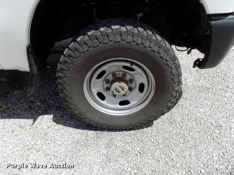 image for item DB9529 2011 Ford F350 Super Duty Crew Cab utility bed pickup truck