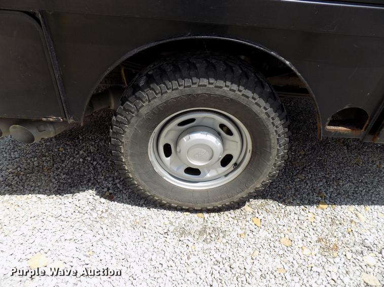 image for item DB9529 2011 Ford F350 Super Duty Crew Cab utility bed pickup truck