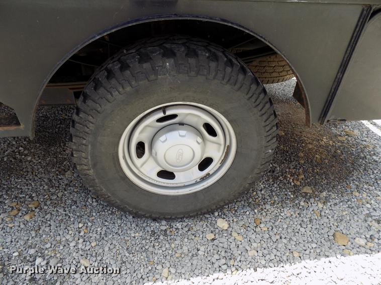 image for item DB9529 2011 Ford F350 Super Duty Crew Cab utility bed pickup truck