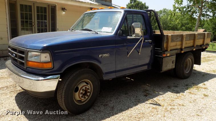 image for item DB9556 1996 Ford F350 flatbed pickup truck