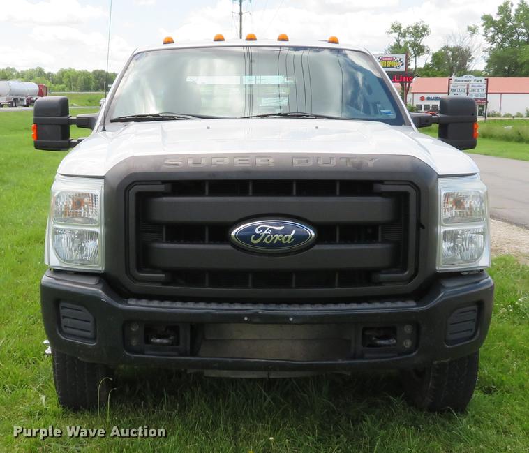 image for item DE8104 2011 Ford F350 Super Duty XL Crew Cab flatbed pickup truck