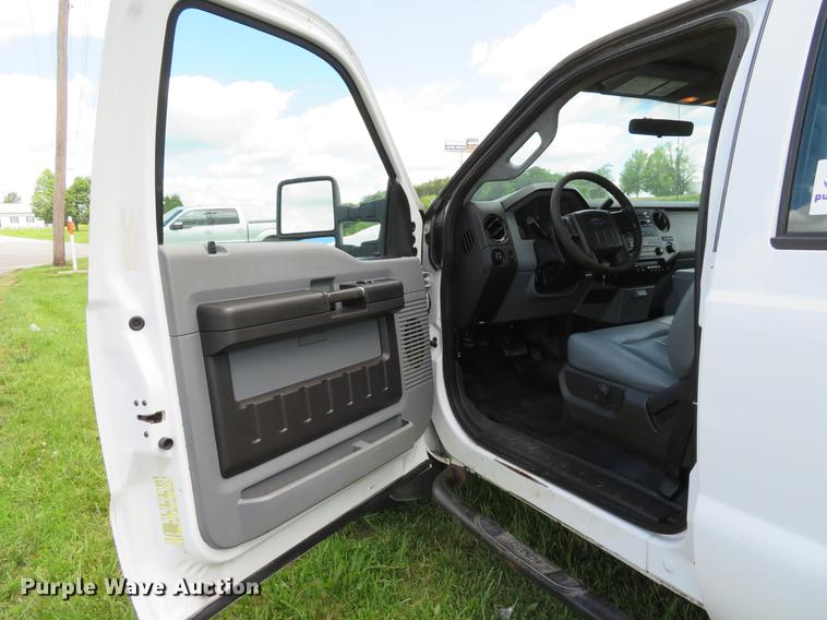 image for item DE8104 2011 Ford F350 Super Duty XL Crew Cab flatbed pickup truck