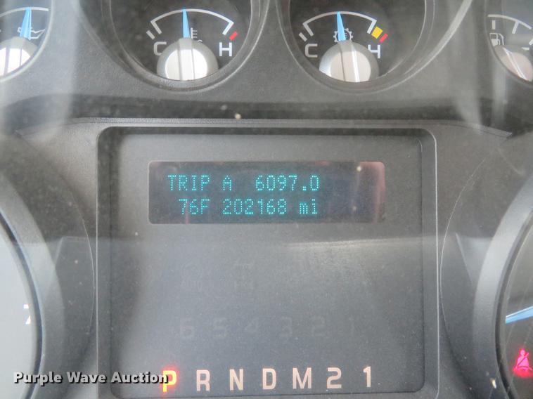 image for item DE8104 2011 Ford F350 Super Duty XL Crew Cab flatbed pickup truck