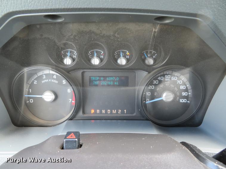 image for item DE8104 2011 Ford F350 Super Duty XL Crew Cab flatbed pickup truck