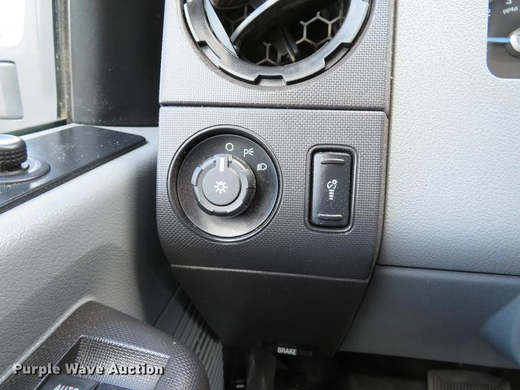 image for item DE8104 2011 Ford F350 Super Duty XL Crew Cab flatbed pickup truck