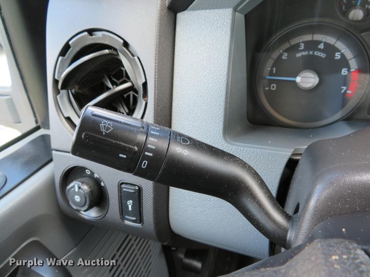 image for item DE8104 2011 Ford F350 Super Duty XL Crew Cab flatbed pickup truck