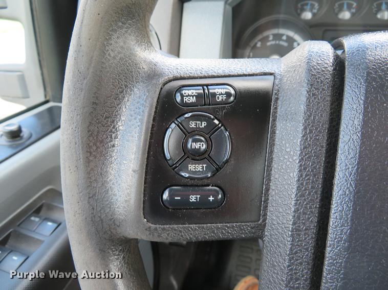 image for item DE8104 2011 Ford F350 Super Duty XL Crew Cab flatbed pickup truck