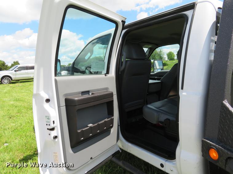 image for item DE8104 2011 Ford F350 Super Duty XL Crew Cab flatbed pickup truck