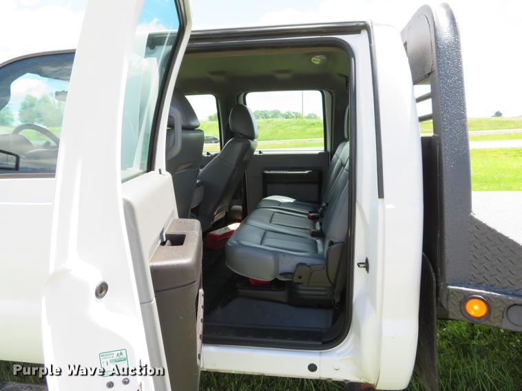 image for item DE8104 2011 Ford F350 Super Duty XL Crew Cab flatbed pickup truck
