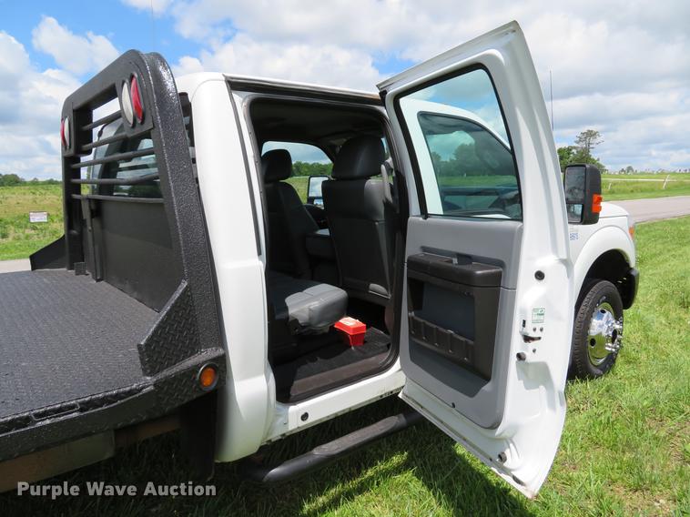 image for item DE8104 2011 Ford F350 Super Duty XL Crew Cab flatbed pickup truck