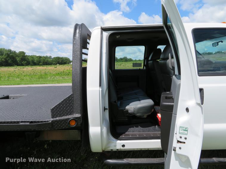 image for item DE8104 2011 Ford F350 Super Duty XL Crew Cab flatbed pickup truck