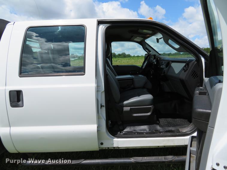 image for item DE8104 2011 Ford F350 Super Duty XL Crew Cab flatbed pickup truck