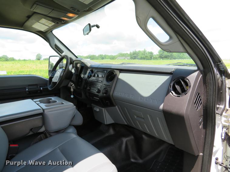 image for item DE8104 2011 Ford F350 Super Duty XL Crew Cab flatbed pickup truck