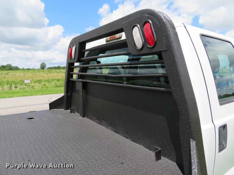 image for item DE8104 2011 Ford F350 Super Duty XL Crew Cab flatbed pickup truck