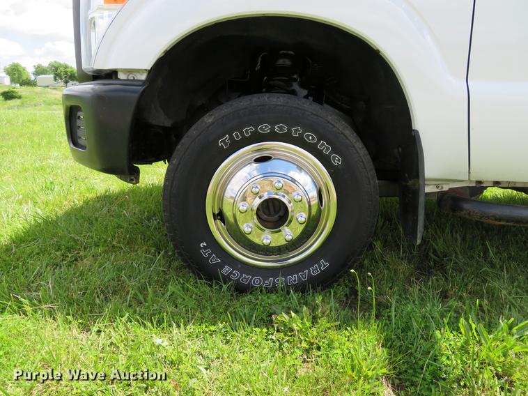 image for item DE8104 2011 Ford F350 Super Duty XL Crew Cab flatbed pickup truck