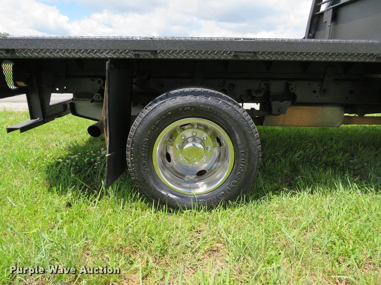 image for item DE8104 2011 Ford F350 Super Duty XL Crew Cab flatbed pickup truck