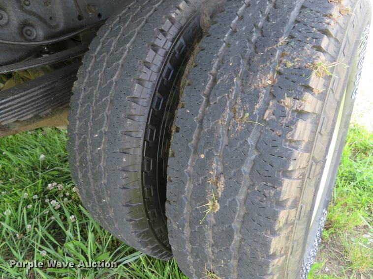 image for item DE8104 2011 Ford F350 Super Duty XL Crew Cab flatbed pickup truck