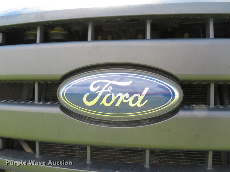 image for item DE8104 2011 Ford F350 Super Duty XL Crew Cab flatbed pickup truck