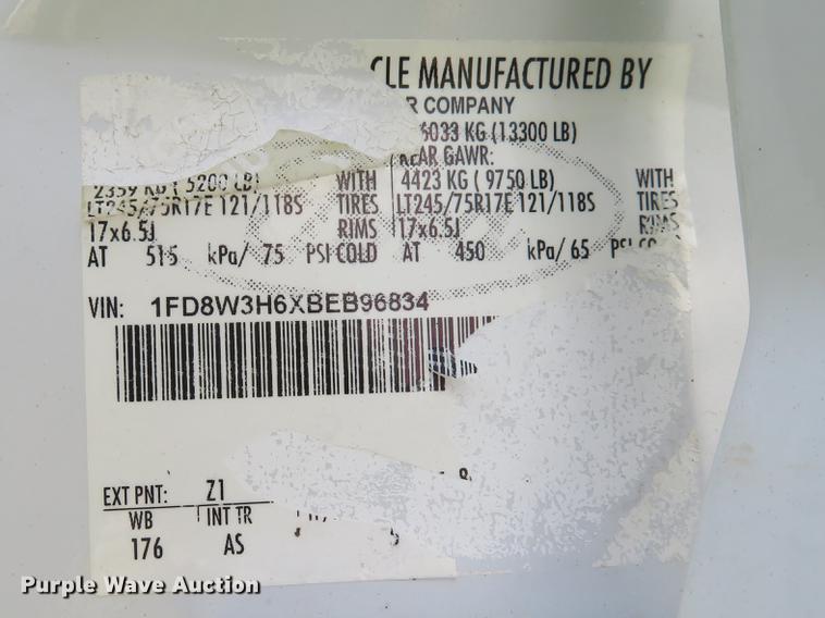 image for item DE8104 2011 Ford F350 Super Duty XL Crew Cab flatbed pickup truck