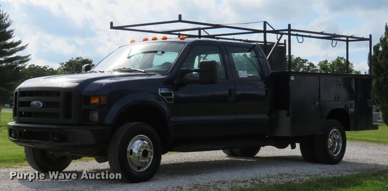 image for item DE8125 2008 Ford F350 Super Duty XL Crew Cab utility bed pickup truck