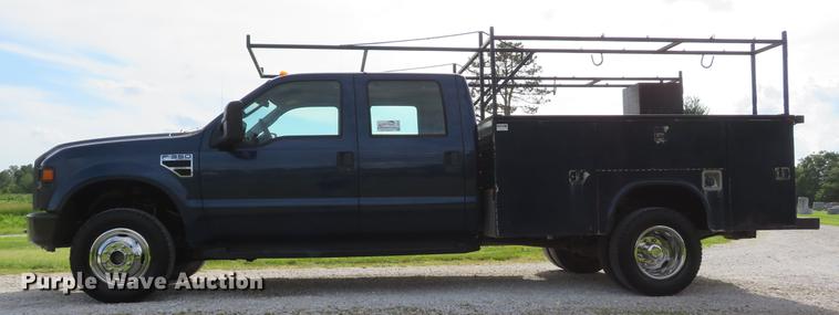 image for item DE8125 2008 Ford F350 Super Duty XL Crew Cab utility bed pickup truck