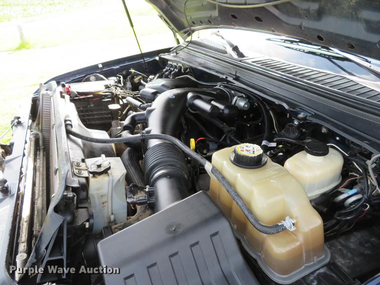 image for item DE8125 2008 Ford F350 Super Duty XL Crew Cab utility bed pickup truck