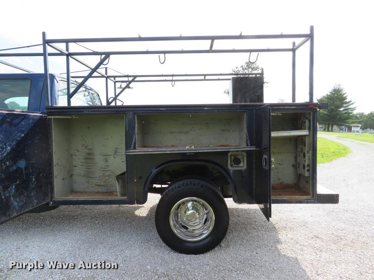 image for item DE8125 2008 Ford F350 Super Duty XL Crew Cab utility bed pickup truck