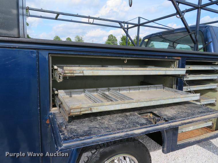 image for item DE8125 2008 Ford F350 Super Duty XL Crew Cab utility bed pickup truck