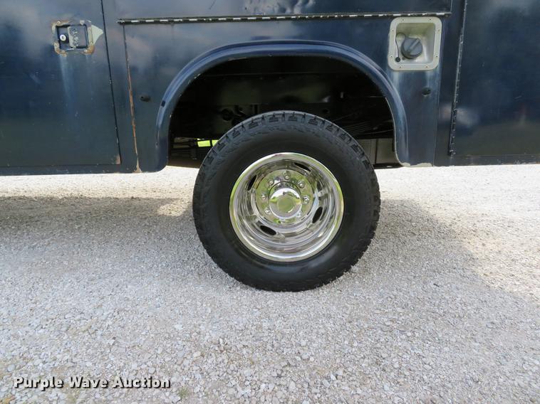 image for item DE8125 2008 Ford F350 Super Duty XL Crew Cab utility bed pickup truck