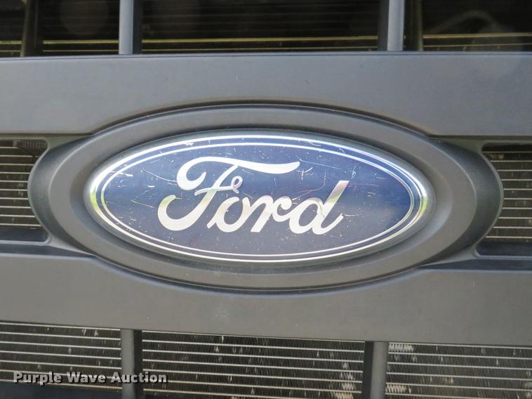 image for item DE8125 2008 Ford F350 Super Duty XL Crew Cab utility bed pickup truck