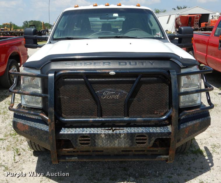 image for item DF7317 2011 Ford F350 Super Duty XL Crew Cab flatbed pickup truck