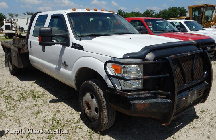 image for item DF7317 2011 Ford F350 Super Duty XL Crew Cab flatbed pickup truck