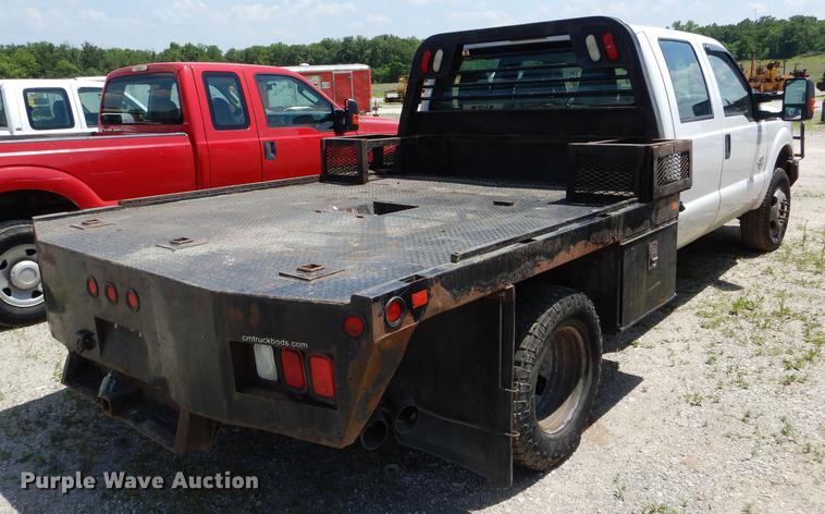 image for item DF7317 2011 Ford F350 Super Duty XL Crew Cab flatbed pickup truck