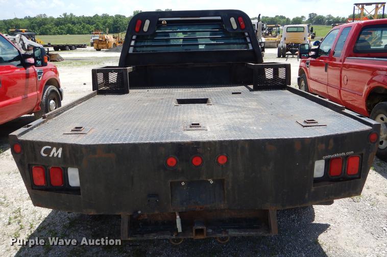 image for item DF7317 2011 Ford F350 Super Duty XL Crew Cab flatbed pickup truck