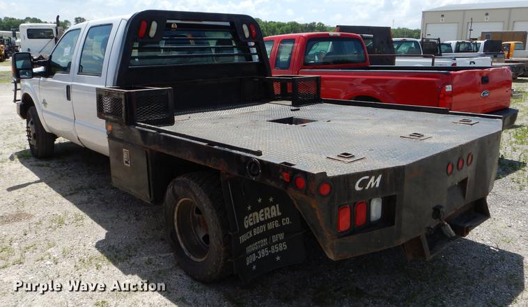 image for item DF7317 2011 Ford F350 Super Duty XL Crew Cab flatbed pickup truck