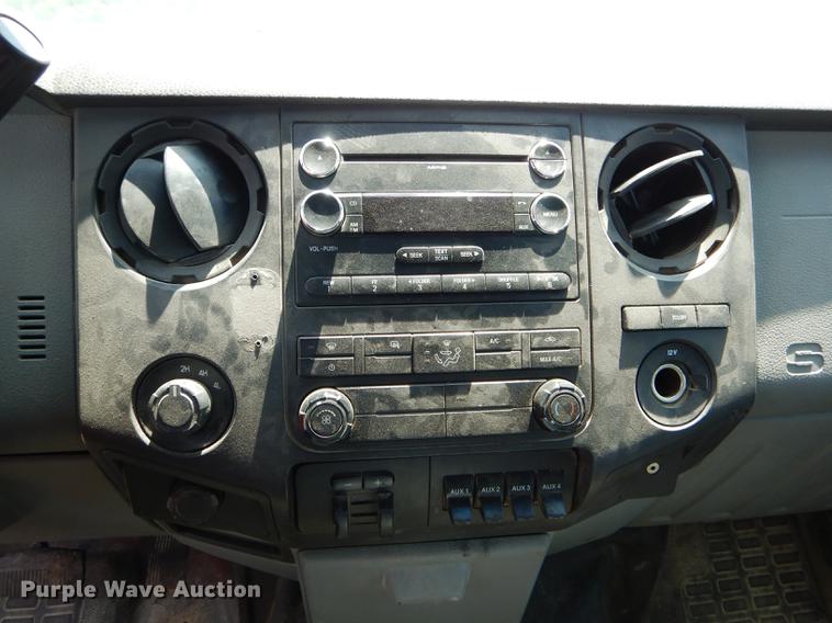 image for item DF7317 2011 Ford F350 Super Duty XL Crew Cab flatbed pickup truck