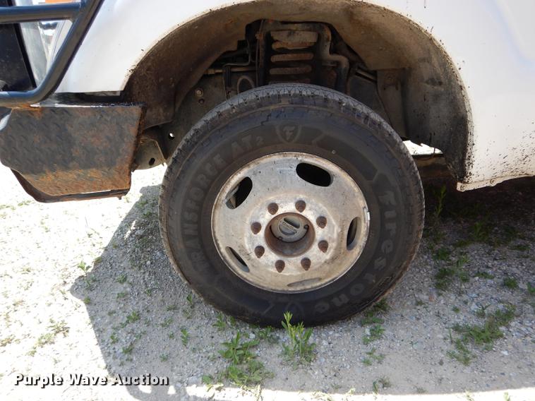 image for item DF7317 2011 Ford F350 Super Duty XL Crew Cab flatbed pickup truck