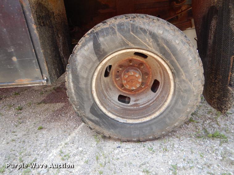 image for item DF7317 2011 Ford F350 Super Duty XL Crew Cab flatbed pickup truck