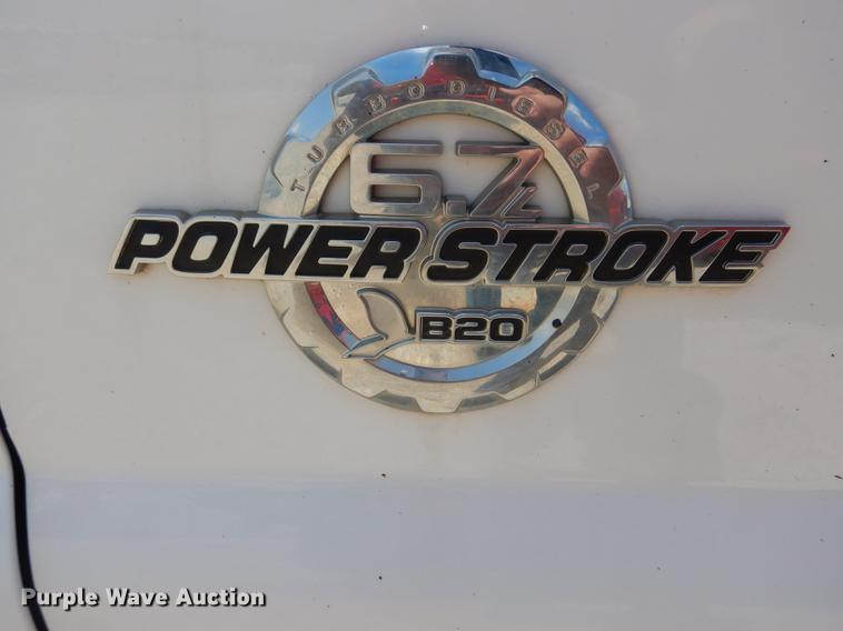 image for item DF7317 2011 Ford F350 Super Duty XL Crew Cab flatbed pickup truck