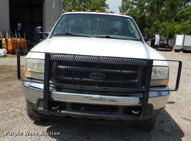 image for item DG1117 2004 Ford F350 Super Duty XL flatbed pickup truck