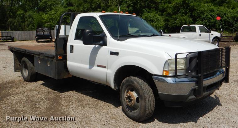image for item DG1117 2004 Ford F350 Super Duty XL flatbed pickup truck