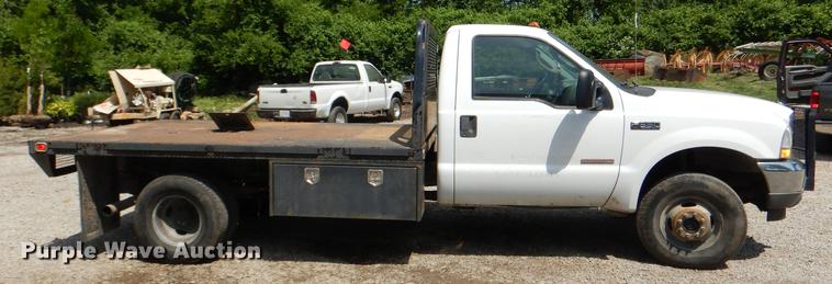 image for item DG1117 2004 Ford F350 Super Duty XL flatbed pickup truck