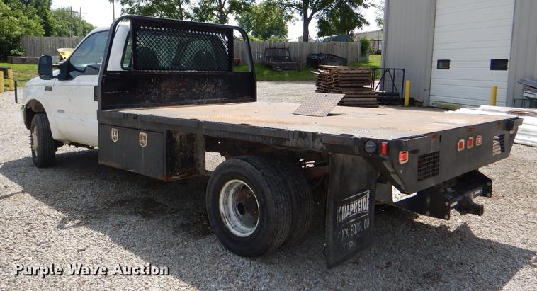 image for item DG1117 2004 Ford F350 Super Duty XL flatbed pickup truck
