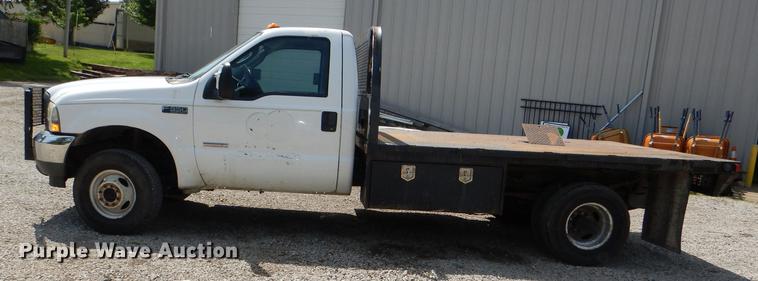 image for item DG1117 2004 Ford F350 Super Duty XL flatbed pickup truck
