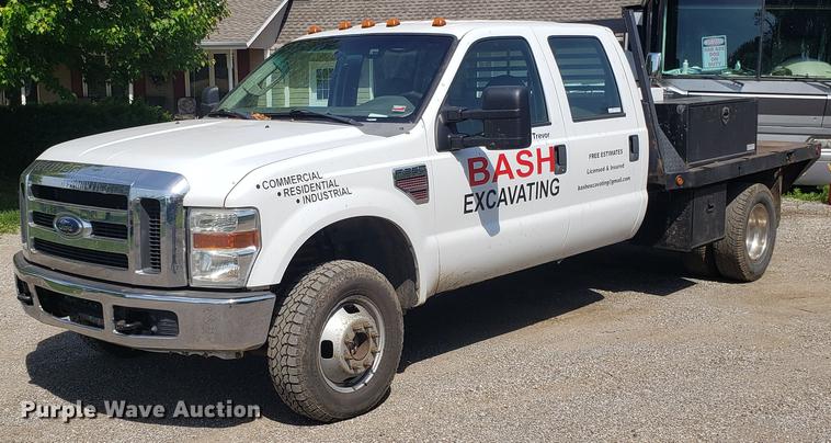 image for item EU9775 2008 Ford F350 Super Duty Crew Cab flatbed pickup truck