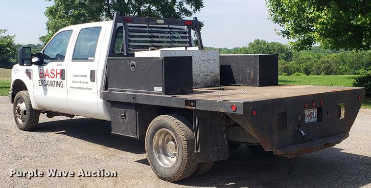 image for item EU9775 2008 Ford F350 Super Duty Crew Cab flatbed pickup truck