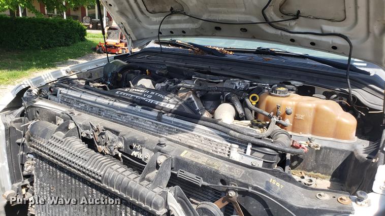 image for item EU9775 2008 Ford F350 Super Duty Crew Cab flatbed pickup truck