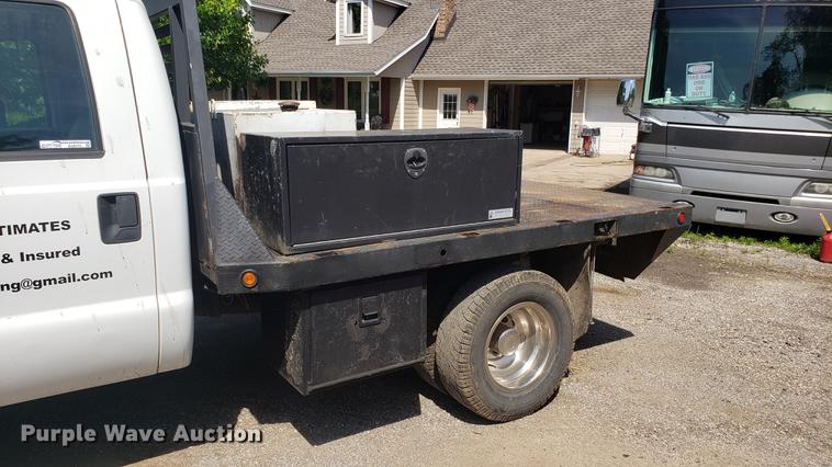 image for item EU9775 2008 Ford F350 Super Duty Crew Cab flatbed pickup truck